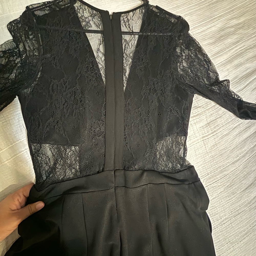 Black lace jumpsuit from Express. Used twice size 12.